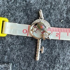 Sterling silver with a natural fire Opal pendant⭐️🌙🗝️